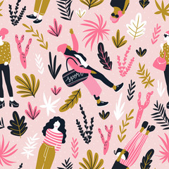 Fashionable young women in casual style with tropical leaves on the pink polka dot background.  Vector hand drawn stylish seamless pattern with girls. Bright fabric design.