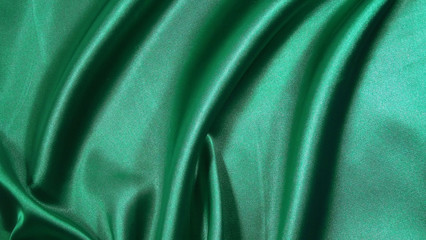 Beautiful green background of light fabric.