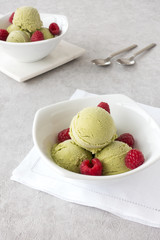 Bowls filled with Matcha Ice Cream and Raspberries