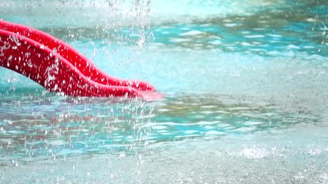 HD 1080 super slow Slider in the water springer spray in the pool	