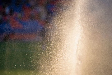Irrigation turf. Sprinkler watering football field.