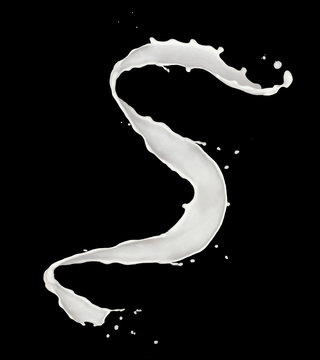 Abstract splash of milk isolated on black background