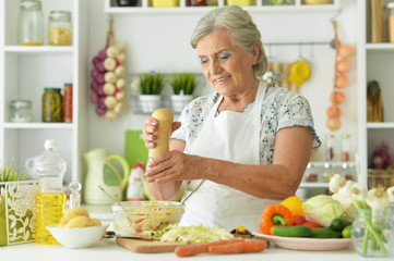 Grandmother cook in the kitchen
