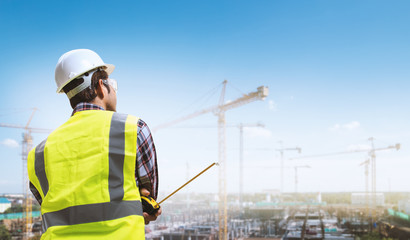 Design engineers are working at building sites.