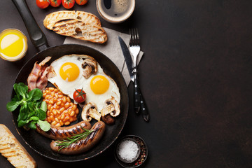 English breakfast. Fried eggs, sausages, bacon