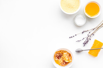 Aromatic theraphy and delicate skin care. Spa set based on honey on white background top view copy space
