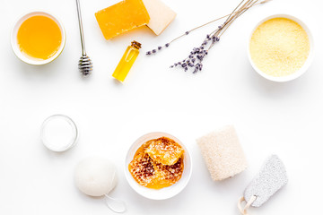 Aromatic theraphy and delicate skin care. Spa set based on honey on white background top view copy space