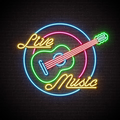 Fototapeta premium Live music neon sign with guitar and letter on brick wall background. Design template for decoration, cover, flyer or promotional party poster.