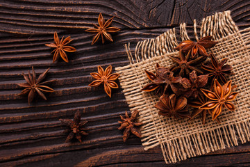 anise stars on a dark rustic background