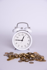 money and clock on a white background