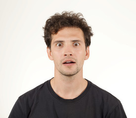 Fototapeta premium Shocking boy with big eyes and opening mouse