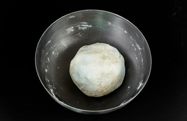 Preparation of cottage cheese pastry: ready dough in a bowl.