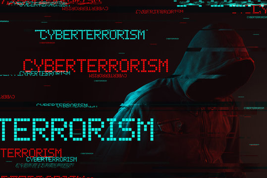 Cyberterrorism concept with faceless hooded male person