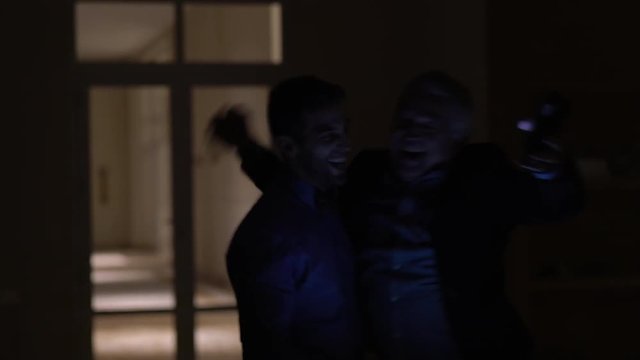 Workers Celebrating and Dancing at Office Night