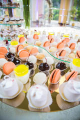 Dessert assortment of cakes on the wedding table