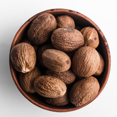 aromatic nutmeg on a white acrylic background