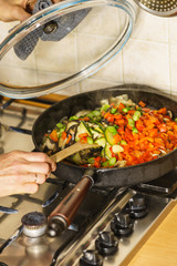 Chopped vegetables on frying pan