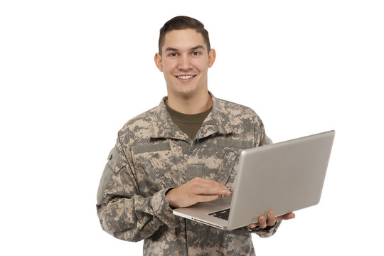 Happy soldier with laptop