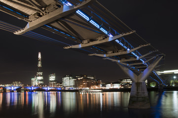 Naklejka premium Beautiful landscape image of the London skyline at night looking along the River Thames
