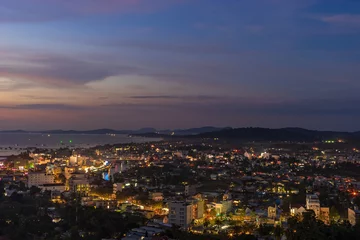Foto op Canvas Aerial night scape view of Duong Dong town on Phu Quoc Island in Vietnam, streets with lights and bay © evgenydrablenkov