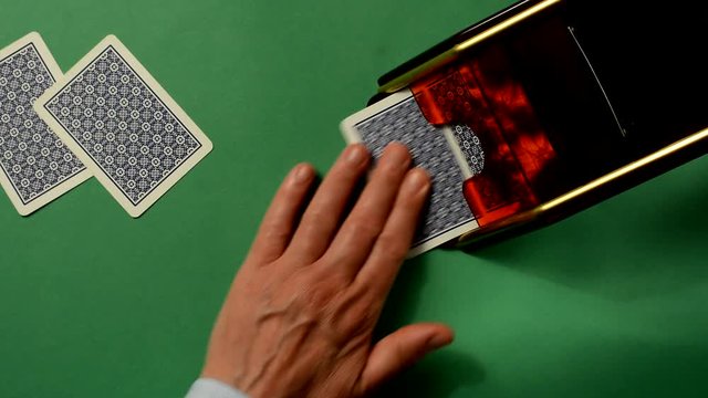 Play on the green table at baccarat - closeup
