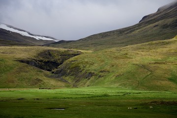 Fototapeta na wymiar Icelandic scenery - mountains and clouds on the peninsula Vatnsnes