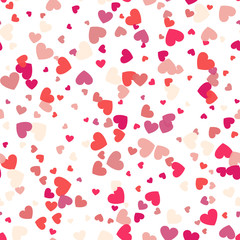 Seamless background with different colored confetti hearts for valentine time