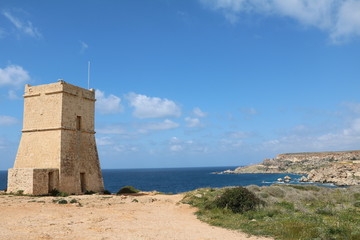 Naklejka premium Way to Ghajn Tuffieha Tower at Golden Bay on the Mediterranean sea in Malta 