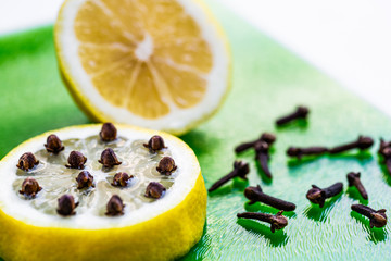 Natural remedy for insects and mosquitoes. Lemon and cloves.