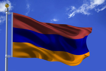 The silk waving flag of Armenia with a flagpole on a blue sky background with clouds .3D illustration.