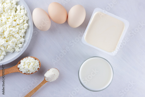 Cottage Cheese Cream And Eggs On A White Background Assorted