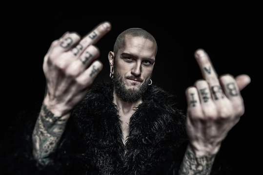 shows indecent gesture