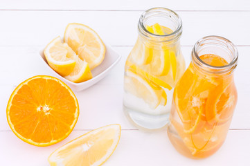 Top view of bottles with detox water.