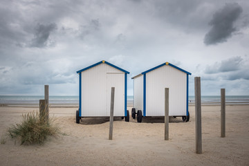 Two vintage beach huts on the beach of De Panne, Sunday 23 July 2017, De Panne, Belgium.