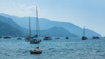 Fototapeta na wymiar Yachts anchored in the bay of Marmaris, Turkey
