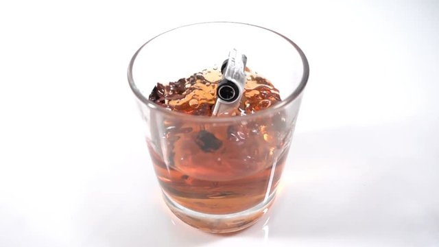 alcohol abuse, drunk driving - the car falls into a glass with alcohol, the concept of an accident while driving in a drunken state, Slow motion