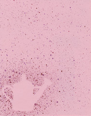 Pink background. Watercolor splashes. Watering can.