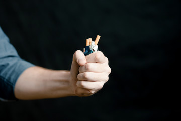 stop smoking crushed pack of cigarettes