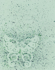 Watercolor splashes on a green background. Silhouette of a butterfly.