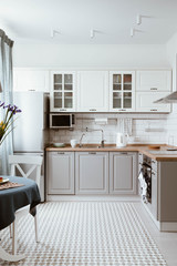 Scandinavian interior design. White grey kitchen room organization