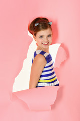 Child girl in stylish glamour elegant dress. child girl has beautiful hair.