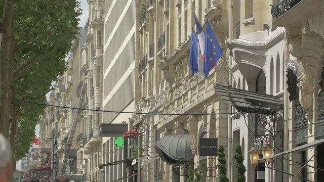 Waving flags above the Marriott Hotel entrance 