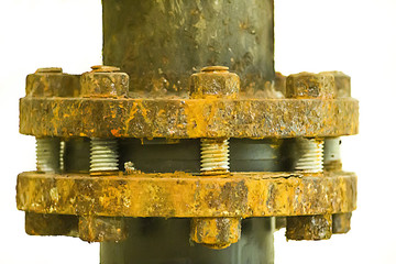 The flanges of valves with bolts and nuts corrosion isolated.