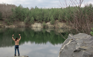 Fototapeta na wymiar relax union with nature man nature training fitness body lake reflection
