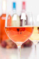 Rose wine in a glass portrait format copyspace