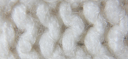 the texture of the knits on the needles close-up