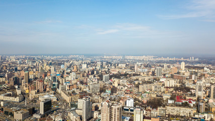 Obraz premium Kiev, city center, panoramic view on a sunny day against the blue sky. Photo from the drone
