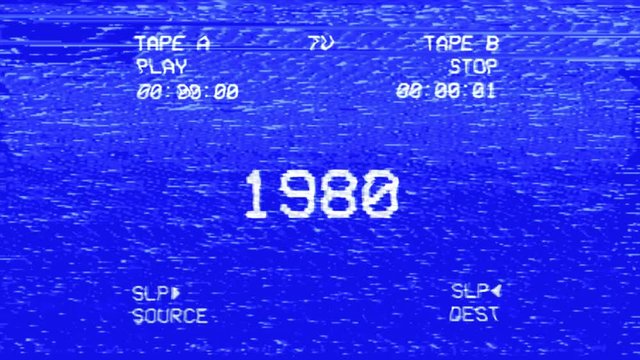 Inserting and removing a VHS cassette tape with the text 1980 from a VCR player recorder, playing a scene: a blank double deck screen showing the same year.
