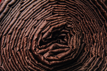 material brown twisted in a roll