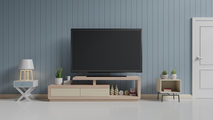 TV on the cabinet in modern living room on blue wall background,3d rendering